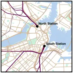 A map of Boston, showing the northern rail lines converging at North Station and the western and southern rail lines converging at South Station.