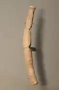 Bow-shaped pendant, northern Germany.[256]