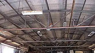 Pre-fabricated steel bow string roof trusses built in 1942 for war department properties in Northern Australia