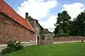South Portal of the Goumont or Hougoumont farm (note that the hut on the wall was demolished due to being built before the battle)