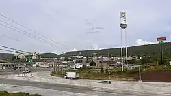 The stretch of U.S. Route 30 in Breezewood, Pennsylvania (looking east), is one of the few gaps in the Interstate Highway System. Interstate 70 traffic uses this surface street to connect the untolled interstate highway with the Pennsylvania Turnpike.