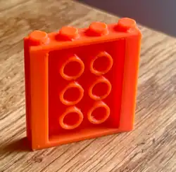 A custom 3D print of a brick system expansion card for Framework Laptop.[134][135]