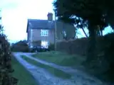 The brick "template" house next door