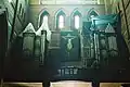 The organ, dating from 1901, and painting of the Crucifixion. Both are on the liturgical West wall beneath the rose window.