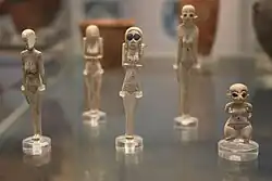 Figurines of bone and ivory. Naqada I. 4000–3600 BC.[64]