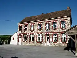 The town hall and school of Brunembert