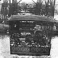 Gondola carrying passengers and cars, 1932