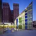 Glass pavilion in front of the building