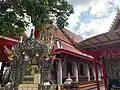 Ubosot building and the shrine to Phra Phrom