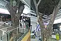 Two trembesi trees within the station, as they were retained during revitalisation, 2023