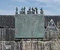 Plaque on the harbour wall commemorating the victims of the Eyemouth Disaster