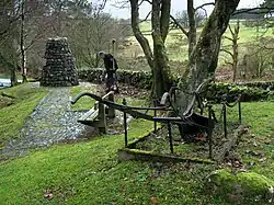 The Burns Cairn in Glen Afton. The inscription on the cairn says "Flow Gently Sweet Afton. Robert Burns 1759 - 1796. Erected by New Cumnock Burns Club (500) to mark its golden jubilee 1973."