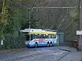 The turning continues until the bus faces the opposite direction