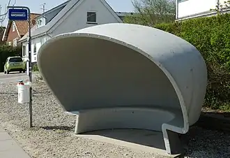 Danish bus stop shelter designed by Poul Cadovius.