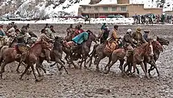 Image 53Players in a game of buzkashi, the national sport (from Culture of Afghanistan)