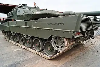 Tank "Francisco de Sande," 3/4 right view with driver in the turret.