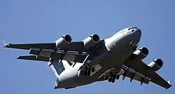 C-17A showing the multiple slotted flaps and slats while flaps are extended at the three quarters position