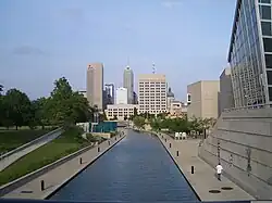 Skyline of downtown Indianapolis from the canal with the Medal of Honor Memorial and Indiana State Museum on the sides