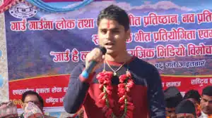 Adhikari singing in a program in Lahachok, Jan 2017