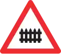 1.15 Level crossing with a railway with barrier or gate[note 3]