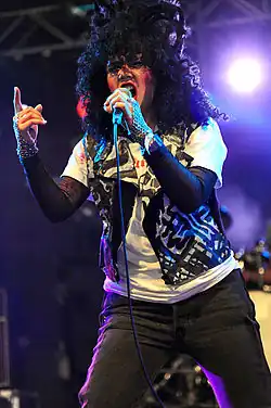 Lovefoxxx performing in 2012