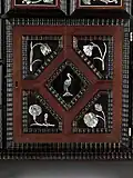 Detail of an engraved mother-of-pearl inlaid table cabinet attributed to Herman Doomer in The Metropolitan, New York, accession number 2011.181.