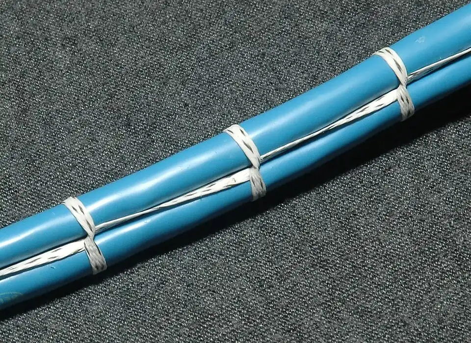 This style of continuous lacing, also called "marline hitching", is based on a series of overhand knots. A series of half-hitches, while visually similar, is not recommended for this application.[9]