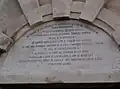 The inscription above the fortress gates.