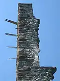 Upper wall showing the wooden beams that supported the hoardings