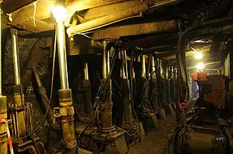 Mechanized cutting with walking hydraulic support and drum-type cutting machine at the Cagnac-les-Mines Departmental Mining Museum