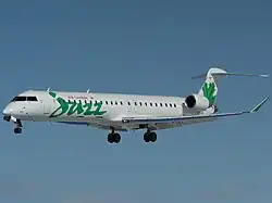 Canadair CL-600-2D15 in green Jazz livery