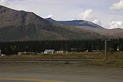Town of Cantwell, Alaska. Tracks for the Alaska Railroad run through the foreground.