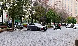 Chilean Carabineros using their motorcycles to stop traffic at La Moneda