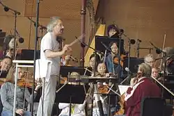 Carlos Kalmar, shown here rehearsing with the Grant Park Festival orchestra in Chicago.