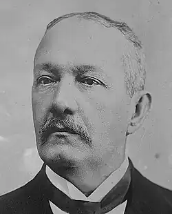 A black-and-white photograph of Carlos Meléndez