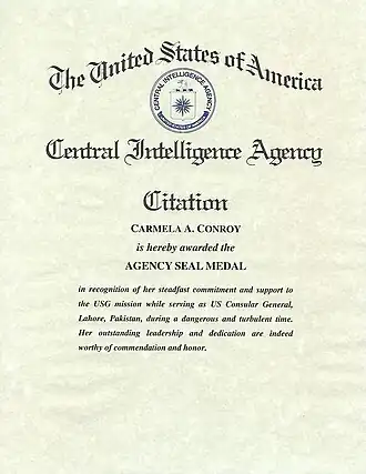 Certificate for CIA Agency Seal Medal issued to Carmela Conroy