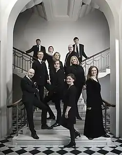 line-up of choir standing in staircase