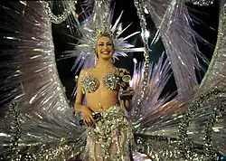 Smiling young woman in Carnival Queen costume