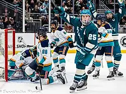 Carpenter and Hilary Knight celebrate after scoring a goal at Climate Pledge Arena, December 3, 2025