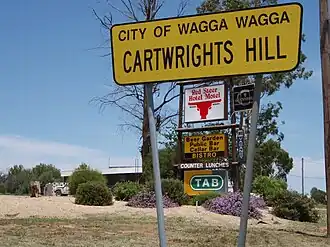 Signage relating to the suburb of Cartwrights Hill
