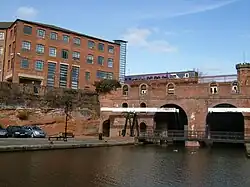 The Bridgewater Canal and the remains of the Grocer's Warehouse in Castlefield.