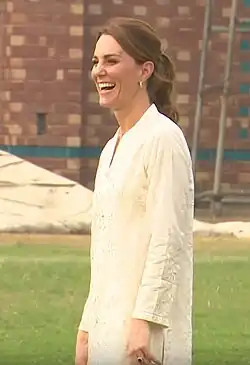 Catherine wearing a white outfit