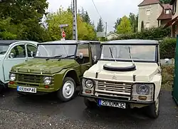 2WD left, 4WD right, with spare wheel on the bonnet