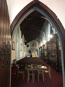 Church entrance with the orange poster, explaining the betrayal and resistance campaign
