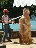 A man carving a Bernese bear with a chainsaw in Brienz, Switzerland