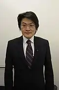 Image 88Example of the two button slim-fit suit popular in the late 2000s in the UK, US and China. (from 2000s in fashion)