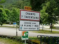 Road signs entering Champs-sur-Tarentaine-Marchal, on the D679 road