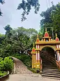 The main entrances at the bottom of the Chandranath Hill. The path on left is for tourists and hikers.
