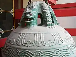 A bell in Chang Chun Temple, Wuhan, hanging on its pulao