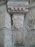 Female figure emerging from the tree of life
